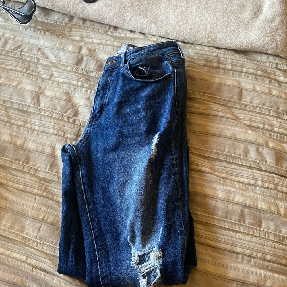 Dark blue mom jeans with rips